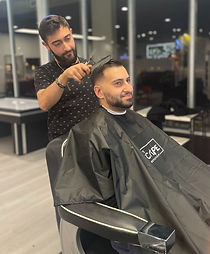 Barber and Client in service
